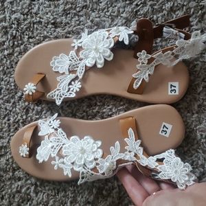 Never worn sandal